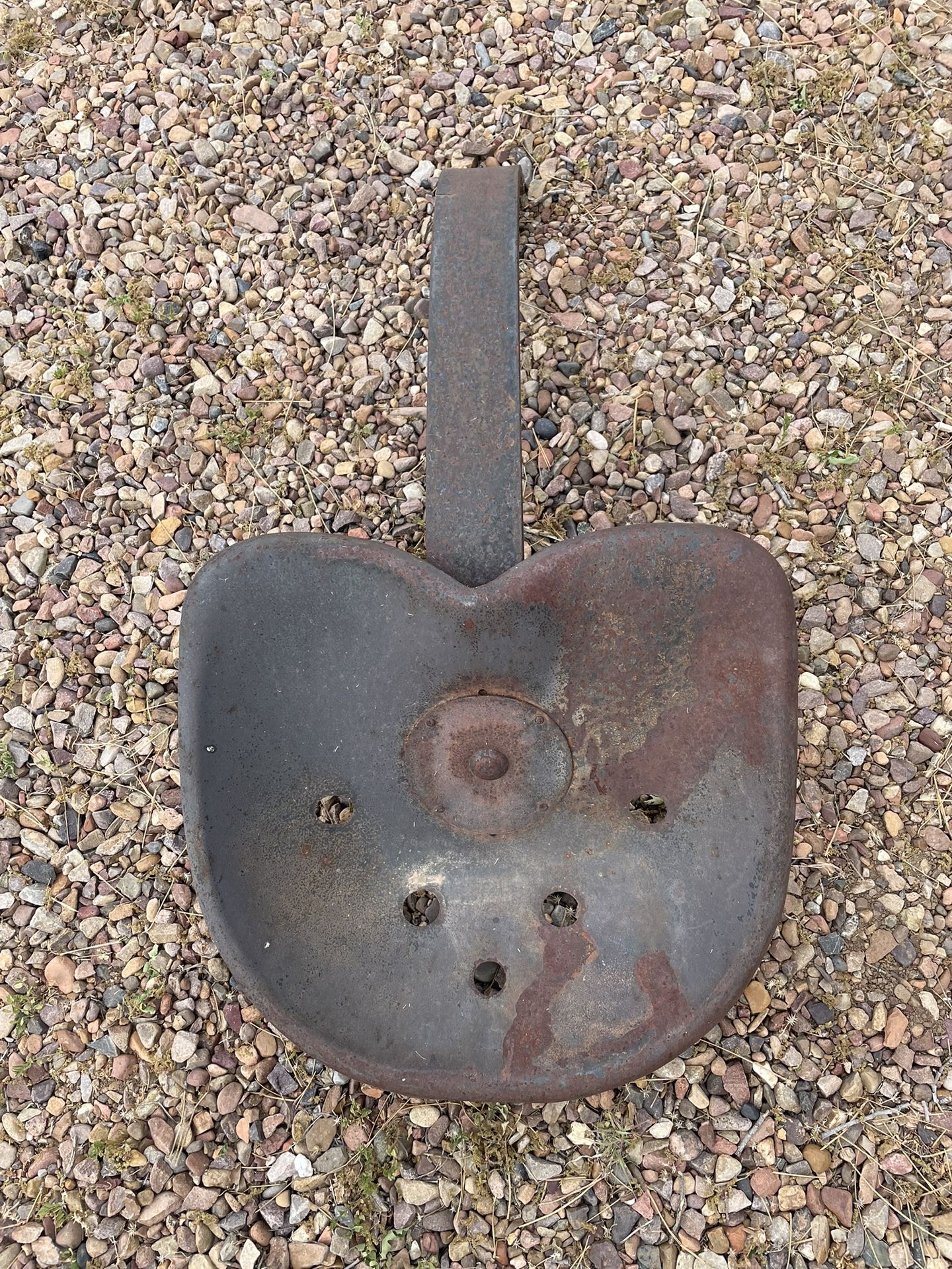 Antique universal tractor seats.