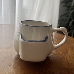 Vintage Potbelly Blue Rim Tea Cup