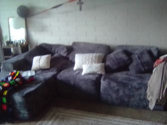 Oh yeah entertainment center in boneless couch only couple months old