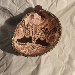 Decorative jewelry/ ring holder. 