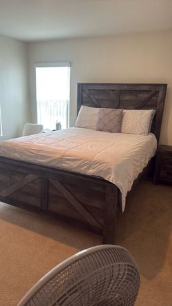 Ashley’s  rustic  queen wood bed frame