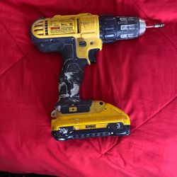 DeWalt half inch cordless drill, driver number DCD771 with the battery