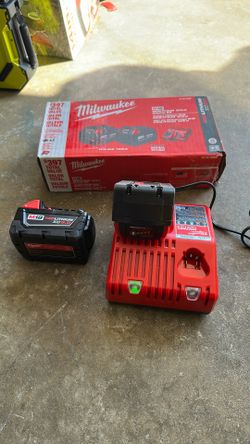 Milwaukee M18 18-Volt Lithium-lon XC Starter Kit with Two 5.0Ah Batteries and Charger. Item #519a
