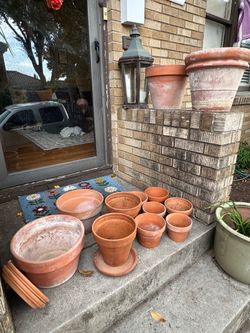 LOT OF 12 TERRA COTTA PLANTERS
