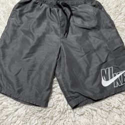 SWIM SOLID COLOR SWIM SHORTS WITH PRINTED LOGO Small on tag