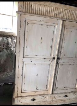 Beautiful distress armoire $300 firm