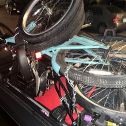 One Beach Cruiser , One Mountain Bikes , Extra Pair Of  Tires For Both Bikes 