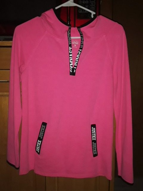 Justice sweatshirt.. size 14