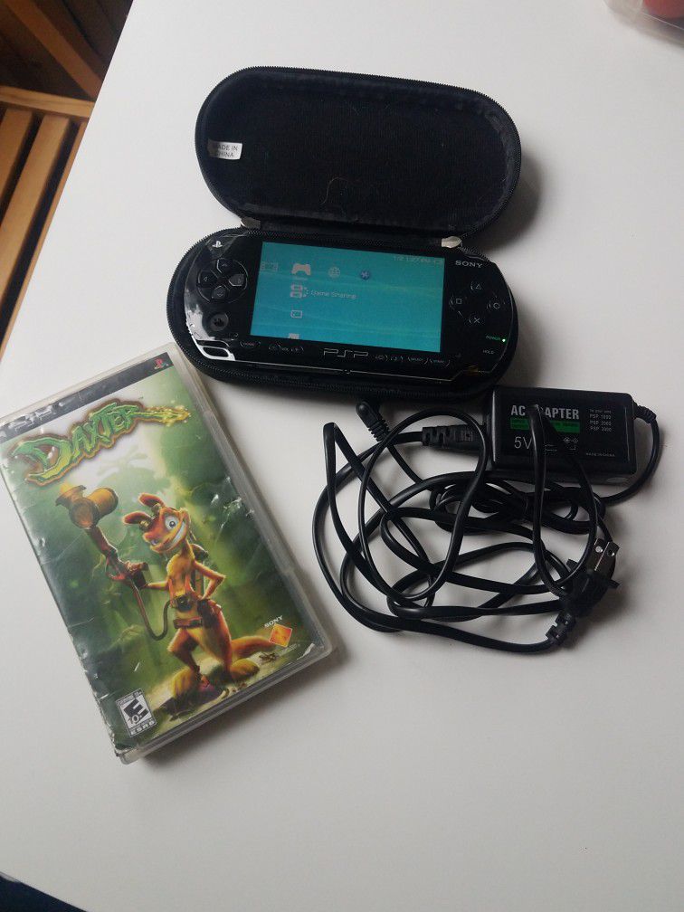 PSP 1001 with games and adapter