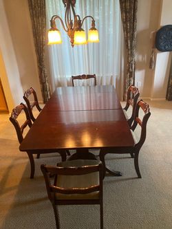 Mahogany Dining Table with 6 Chairs and Matching china cabinet