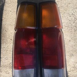Nissan Hardbody Pickup ( Frontier , Navarro , D21 ) OEM Tail lights fits 1986 to 1997