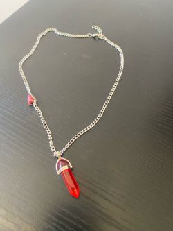 Necklace with red pendant
