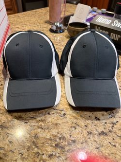 2 new NU FIT adjustable baseball hats
