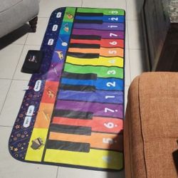 SUNLIN FLOOR PIANO  LIKE NEW! Not Negotiable 