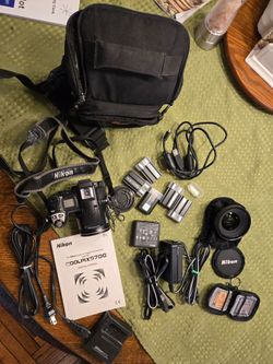 Nixon Coolpix 5700 with additional wide angle lense.