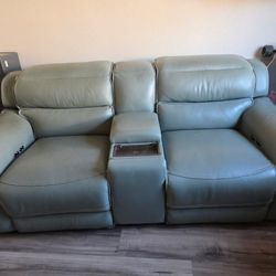 Reclining love seat with wireless charging console