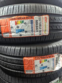 BRAND NEW SET (4) 215 70 14 TIRES !!!