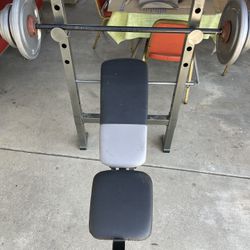 Weight Bench / Bar / Weights.    110 Dollars 