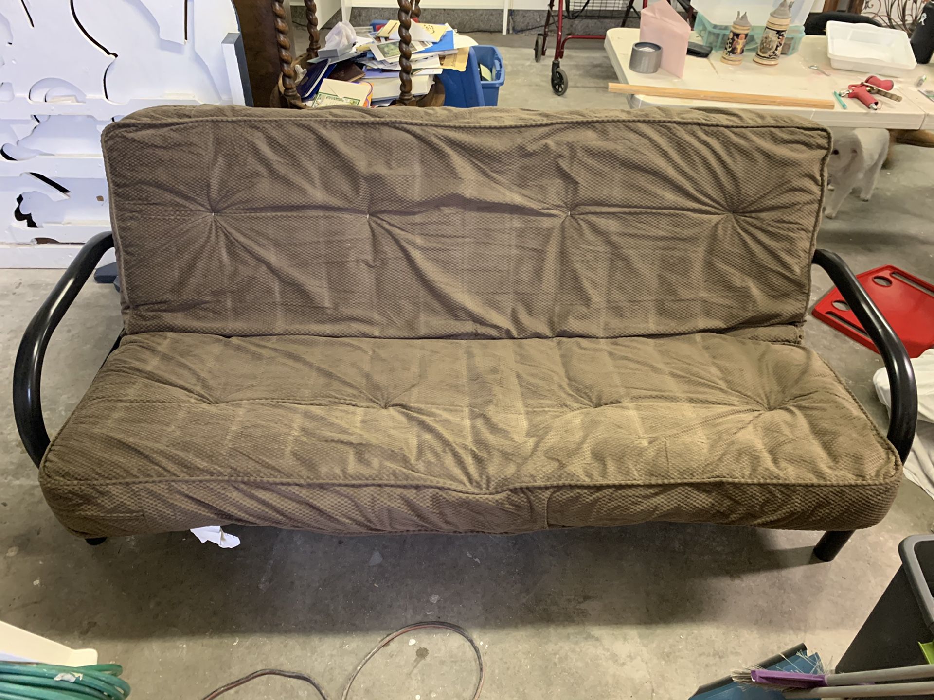 Futon. A couch and also turns into a bed. Couple scratches but works great!