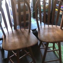 2 Brown Swivel Bar Height Chairs 