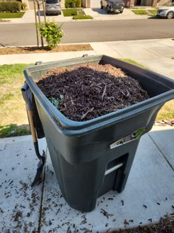 free mulch 3 big  trash bins