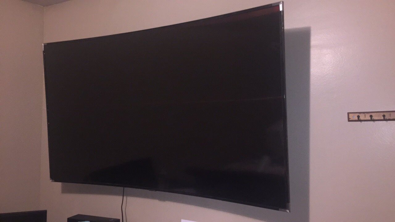 65” curved Samsung tv with wall mount