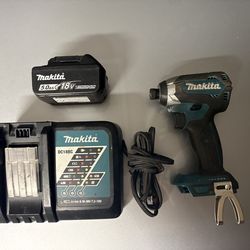 Makita XDT13 Impact Driver, Charger  and 18v  5 amp Battery
