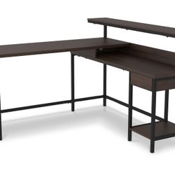 Brand New in Box Camiburg 55" L-Shaped Home Office Desk with Shelf by Ashley. H283-24