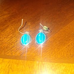 vintage blue cat's eye pendant in a sterling silver setting. 