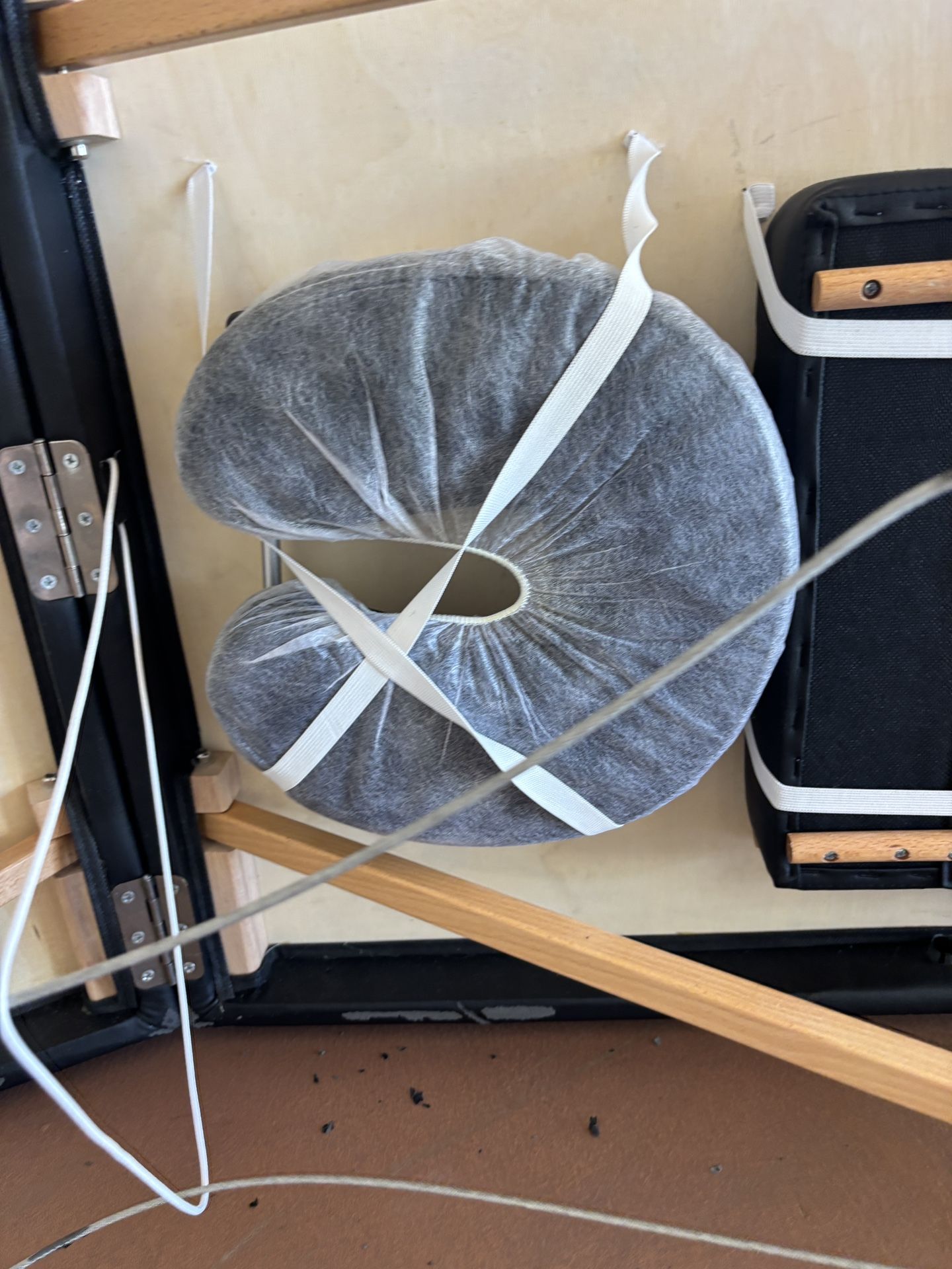 One Black Massage Table With accessories and Black Carrying Case