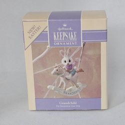 NEW 1991 Hallmark  GRANDCHILD Bunny on Rocking Horse Easter Ornament SPRING colors
Brand new,  never displayed 
1991 Hallmark Granchild 
Smoke free an