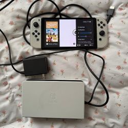 OLED white Nintendo Switch 2O95
