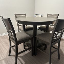 DINING TABLE AND 4 CHAIRS