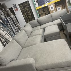 Gray Sectional With Storage Ottoman