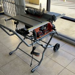 RIDGID TABLE SAW WITH BEVEL LOCK LEVER.