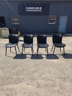 Set of 4 pre-owned dining chairs, $100
