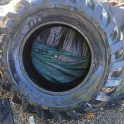 Tractor Tire 14.9x24;  With 65 % Remaining