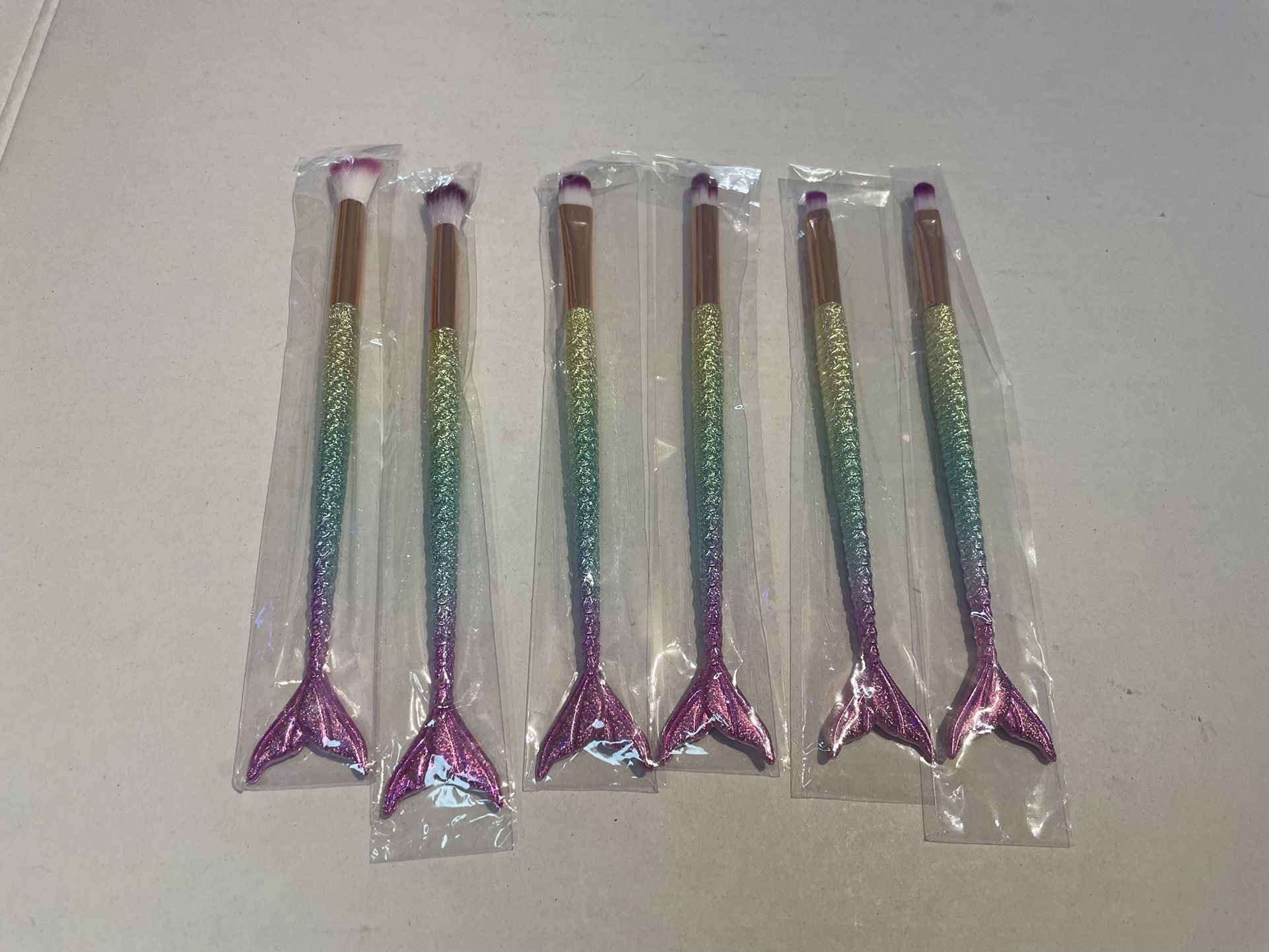 Makeup brushes mermaid set of 6 Brand new brushes. (AE)