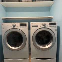 LG Washer And Dryer Set With Pedestals 