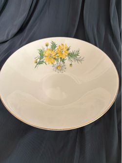 Vintage bowl with yellow flowers