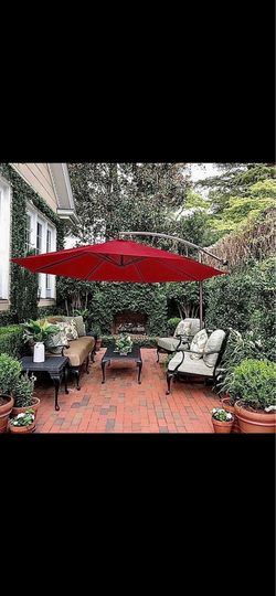 Brand new offset cantilever patio umbrellas with base
