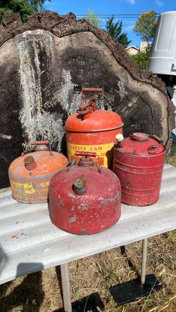 4- Vintage Metal gas cans