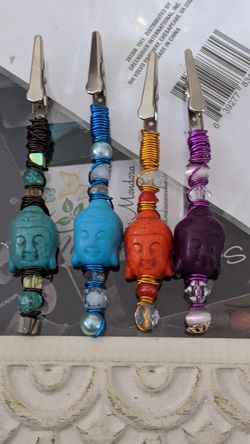 Roach clips and blunt holders