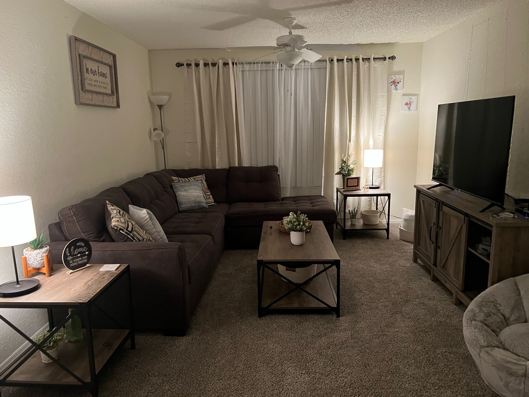 Living room sofa with two small tables plus the coffee table