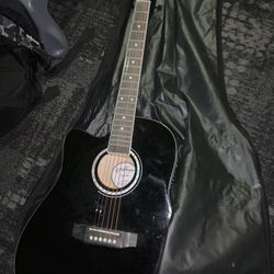 Left Handed Acoustic Guitar (ashthorpe)
