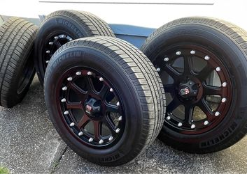 Set of 18 inch Chevy Jeep Dodge 5 lug wheels and tires