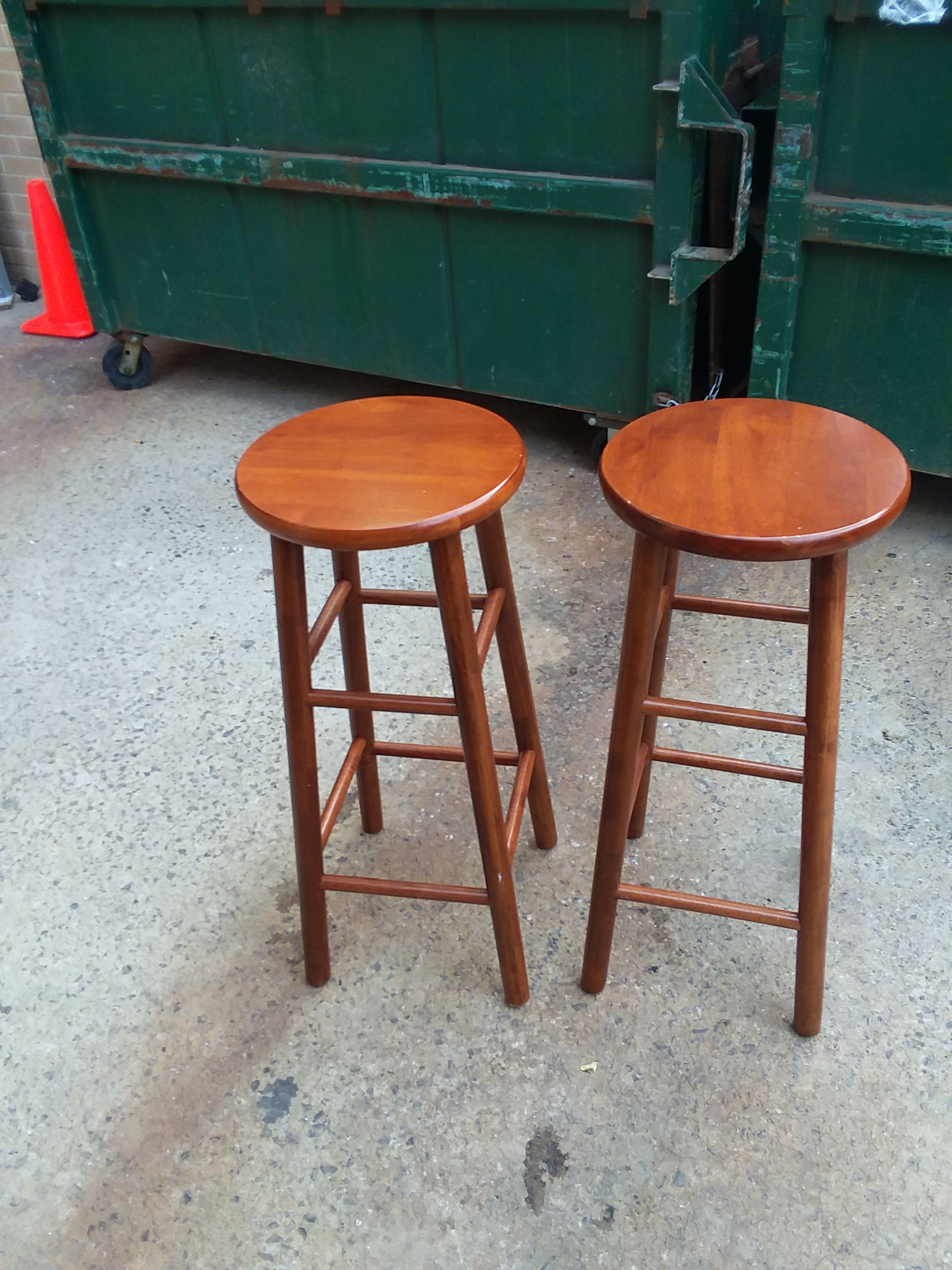 Two brown stools