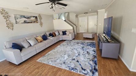 Modular Sectional Sofa with Ottoman, Power Outlets & Cup Holders