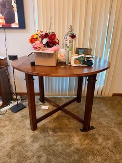 Round Wood Dining Table with Cross Stretcher Base