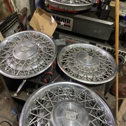 76 cadillac rim covers 